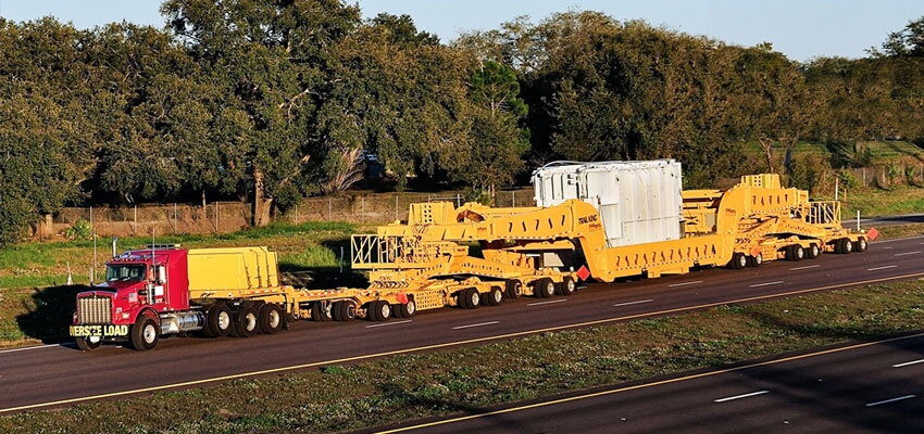 Crane Rental Corporation hauls transformer on dual-lane trailer 24fae0cf4e190078d5b9896e00870cd9