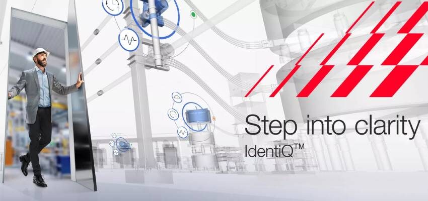 Hitachi Energy launches IdentiQ™ digital twin a man entering through a door