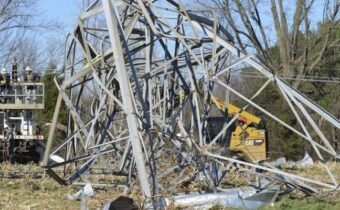 US public power utilities restoring power in wake of tornadoes power pylon