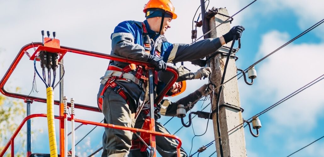 DTE installing smart devices to reduce outages electricians_Shutterstock_2398214065