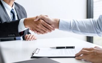 New leadership boosts TAGAL joint venture handshake_Shutterstock_1823855324