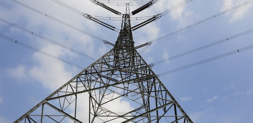 Adani awards HVDC contract for renewable energy link transmission tower_shutterstock_667749187